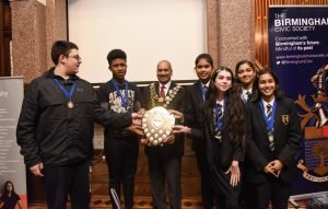 Winners of the 2019 Next Generation Awards stood around Birmingham's Lord Mayor