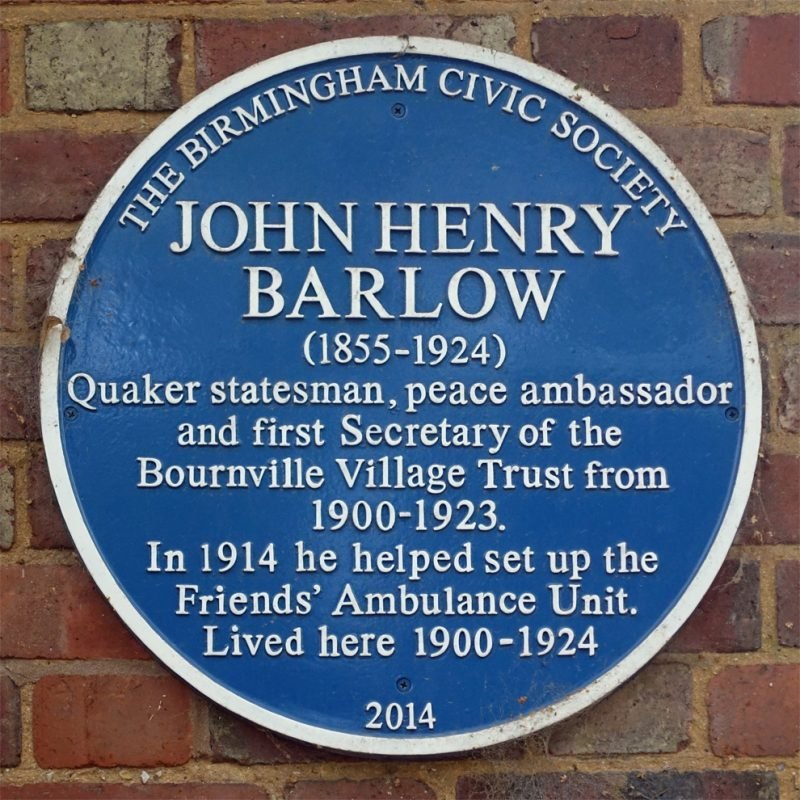 John Henry Barlow Blue Plaque "1855-1924, Quaker statesman, peace ambassador and fisrt secretary of Bournville Village Trust from 1900-1923. In 1914 he helped set up the Friends Ambulance Unit. Lived here 1900-1924"